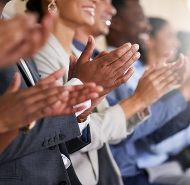 Image of people clapping