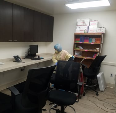 home health office being cleaned by cleaning technician 