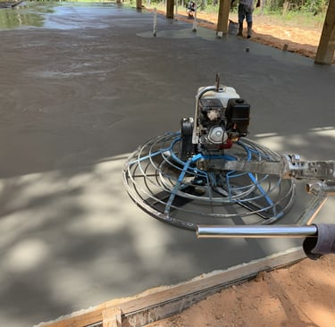 Concrete pouring and finishing process in Navarre FL by professional concrete contractor