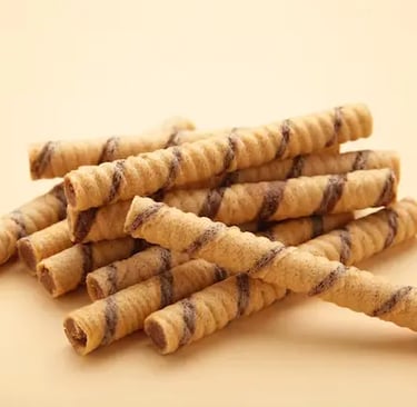 Variedad de barquillos, galletas y obleas para degustar con un cafe o de postre