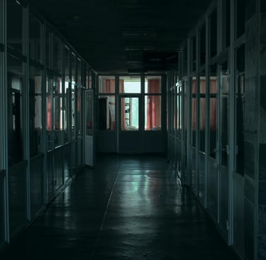 Empty office corridor representing the emptiness of a person in burnout