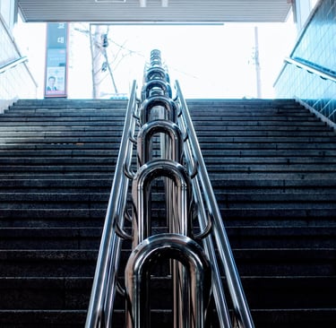 Upward staircase symbolizing leadership progression and the steps required to grow through the pipeline.