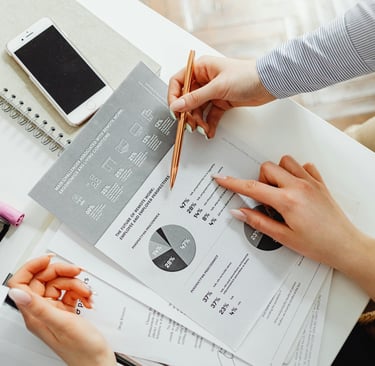 A team looking at data, having a positive conflict resolution