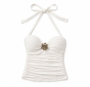 Chic white halter top flatlay with soft neutral aesthetic