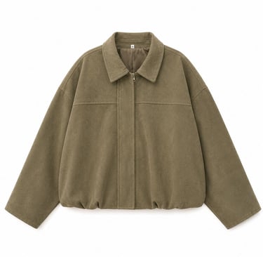 Neutral oversized jacket flatlay with modern feminine styling