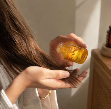 Glossy hair oil for smooth frizz-free healthy hair