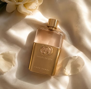 Luxury Gucci Guilty perfume bottle with soft natural light and a neutral aesthetic background.