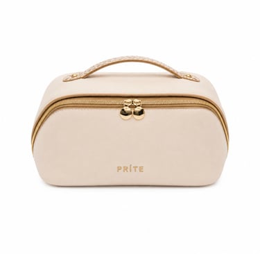 Beige makeup bag with gold hardware isolated on a white background.