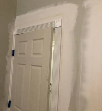 drywall repair around door