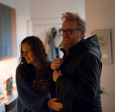 Happy expat couple settled in their Murcia home with comprehensive insurance coverage from Allianz