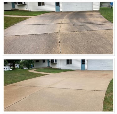 Discoloration removed after our driveway pressure washing service in Holiday, FL