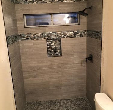 Affordable Showers specializes in bathroom remodeling, tub-to-shower conversions, vinyl showers