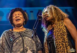 Rhonda Merrick and Peaches Embry On stage at Washington's