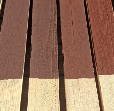 Exterior wood siding painted with breathable heritage barn paint