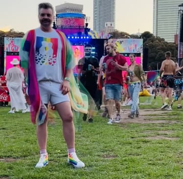 Gay kiss tee worn by LGBTQIA+ brand Flamingay founder