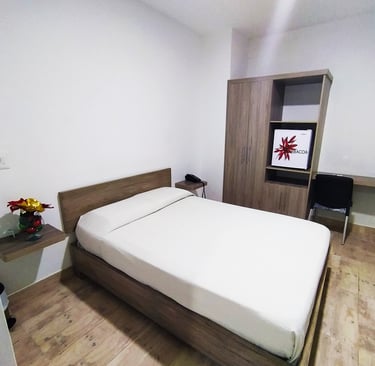 Habitación con aire acondicionado en Apartadó. Alojamiento minimalista Hotel Barbacoa. Habitación