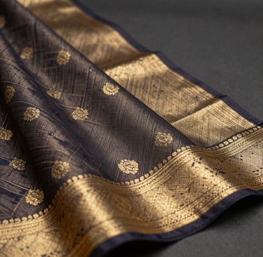 Office wear saree in muted tones with clean lines, paired with a simple blouse on a wooden hanger