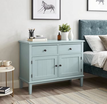 Reused furniture painted and refreshed in a modern bedroom setup