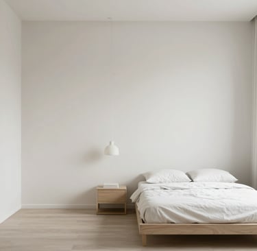 Minimalist bedroom with clean lines, neutral tones, and minimal decor.