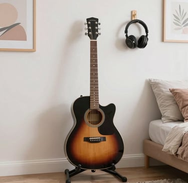 A music themed bedroom with a guitar on a stand, headphones on a hook, and subtle wall art, arranged