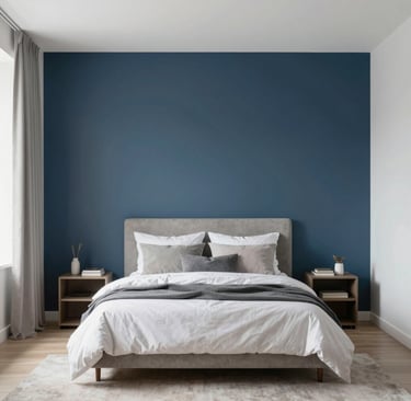 Accent wall behind bed with bold design while the rest of the room stays minimal and light