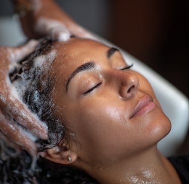 Woman getting her scalp massaged