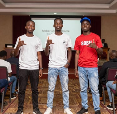 A group photo of the founding members smiling together during a resilience workshop.