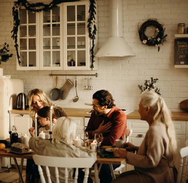 a family sitting around the dining table