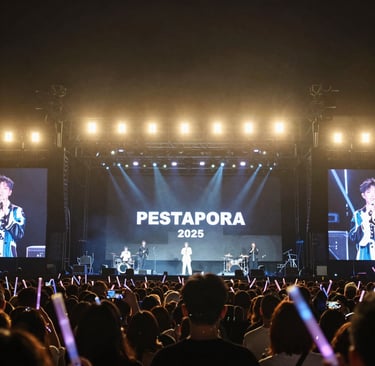 Excited fans holding tickets and cheering at a popular event venue