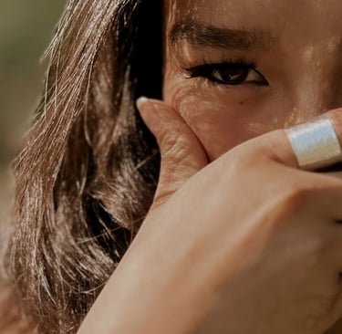 a woman with a ring on her finger