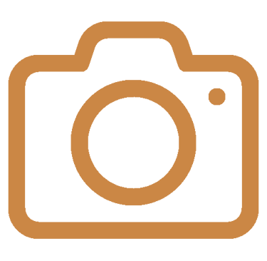 A brown DSLR camera line icon representing photography, media, or digital imaging.