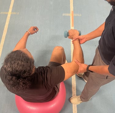 Elbow pain physiotherapy treatment in Neath, South Wales.