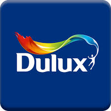Dulux paint brand logo with white text and a colorful rainbow swirl on a navy blue background.