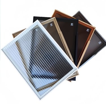 Assortment of multi-colored aluminum air vent grilles in various finishes (black, brown, white) for HVAC systems and home ven