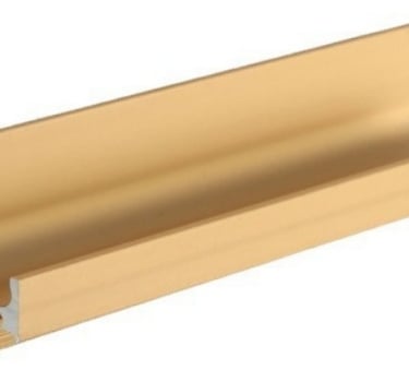 Aluminum L-shape groove pull handle installed on a white cabinet edge, showing recessed design and anti-slip inner edge