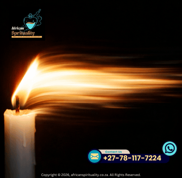 A lit white candle with a long golden flame for African spirituality rituals and healing.