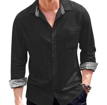 a man in a long sleeve black shirt and sunglasses