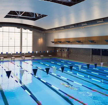 a swimming pool with flags and flags on it