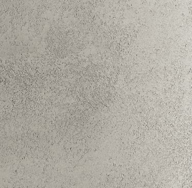 Light grey textured concrete wall background with a grainy plaster finish. 