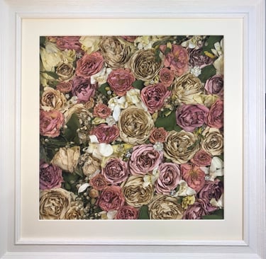 a flower wall style preserved wedding bouquet of beautiful soft hues