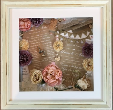 memory box full of wedding items, cufflinks preserved flowers and invites