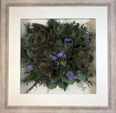 Gorgeous succulents and stems in a Birdseye view preserved wedding bouquet in a frame