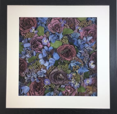 a Flower Wall Style bouquet of flowers in a thin black frame
