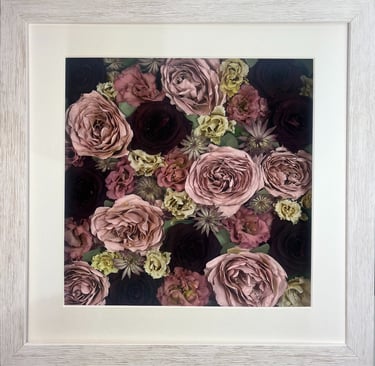 a pink and deep red flower wall style preserved wedding bouquet in a frame