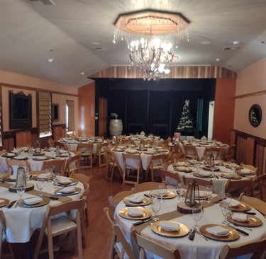 Dining event set up for  Christmas event in the Upper Flat. 