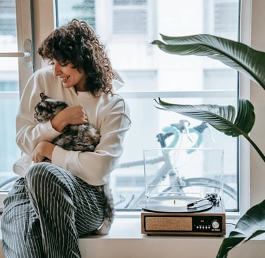 a woman holding a cat