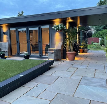 Dark grey composite wood garden room