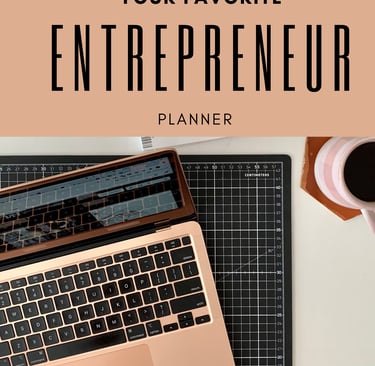 a laptop computer and a cup of coffee with a planner
