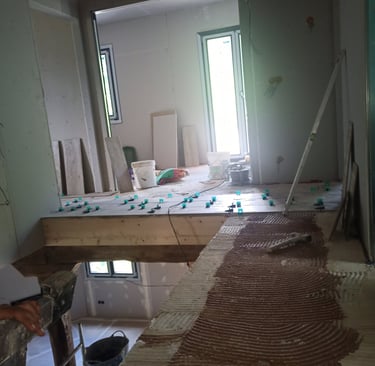 a room with a lot of wood flooring and a flooring area