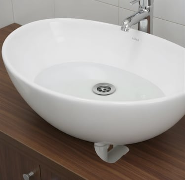 Demonstration of a waste coupling fitted in a wash basin